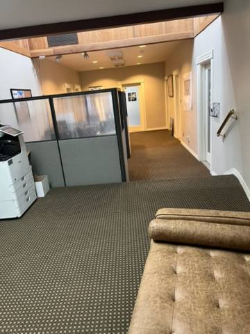 Clean office reception area with fresh carpet lines
