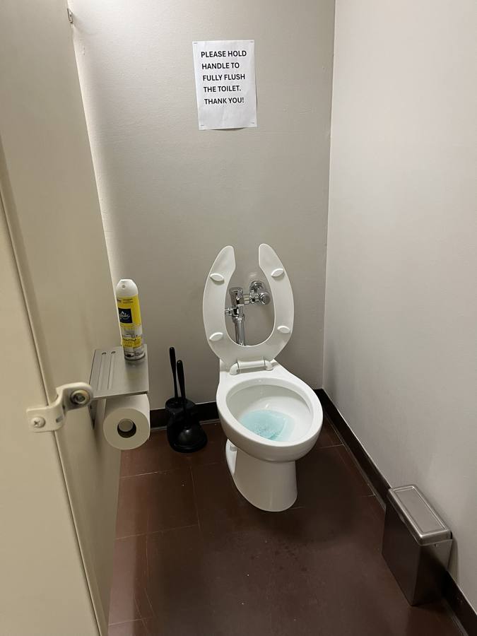 Sanitized and restocked restroom after cleaning service