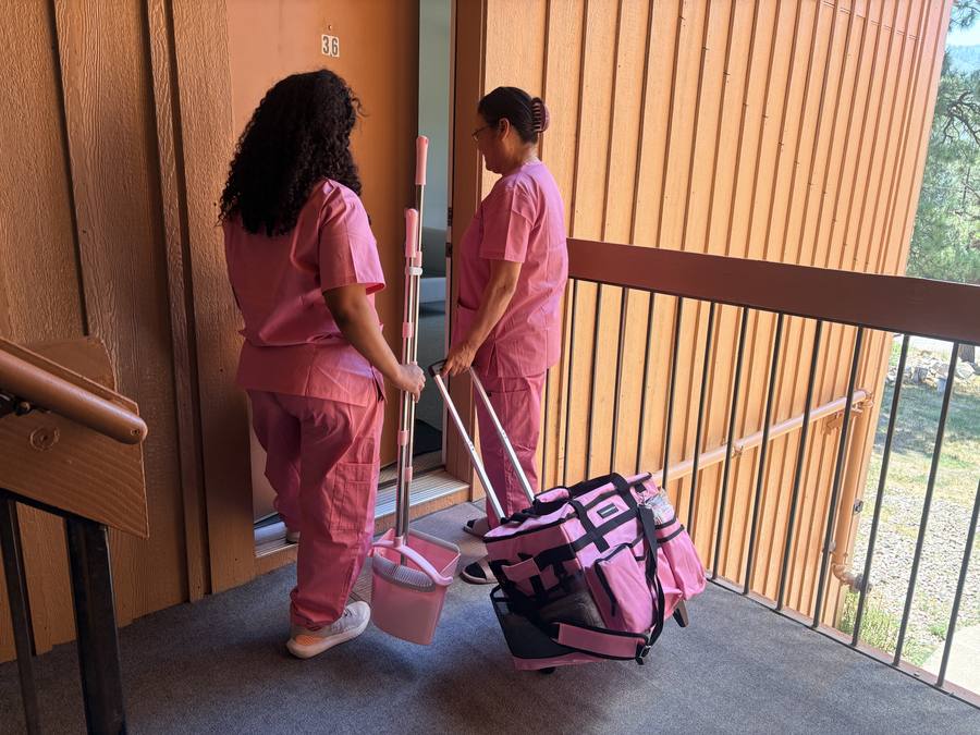 Animas Cleaning team arriving at a Durango home with professional cleaning supplies